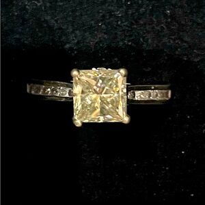 authentic, pale green Moissanite , Center-stone about 2 carets size 7 half 925